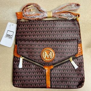 MKF - Brand new MKF purse with tags and protective paper on zipper pulls.